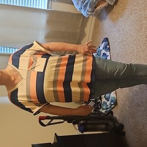 Shirt Sleeve T shirt with small pocket.